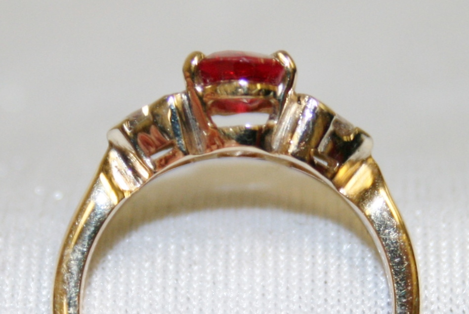 Pink Sapphire and Diamond Three Stone Ring