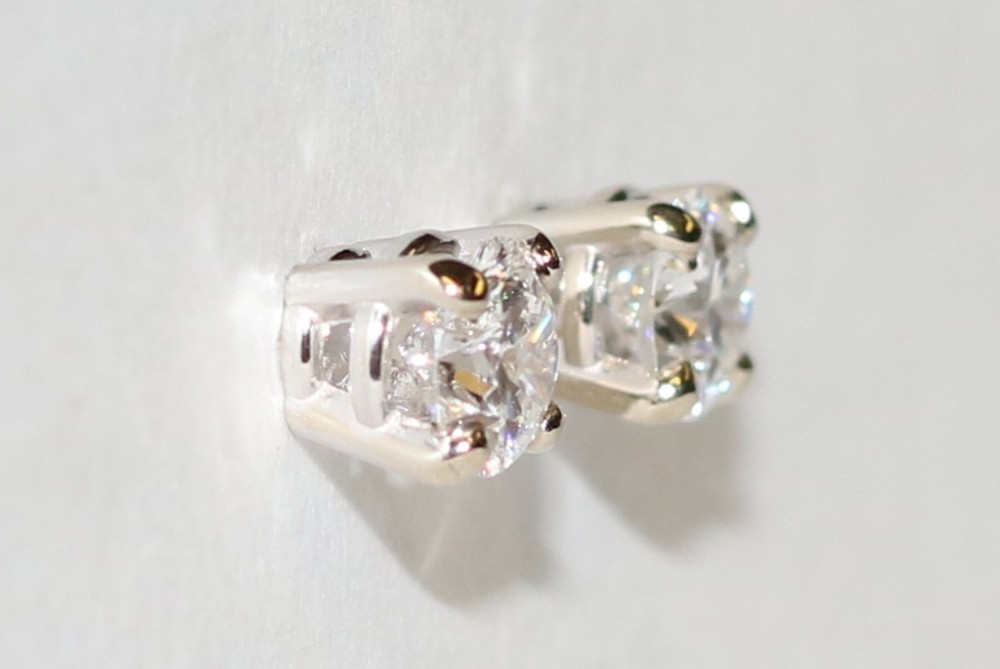 Round Brilliant Cut Diamond Stud Earrings – 0.88ct. Total Weight