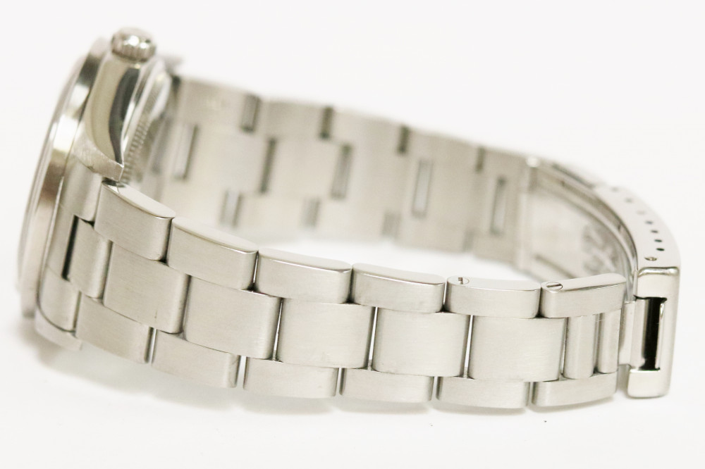 Rolex Oyster Date White Roman Dial 34mm