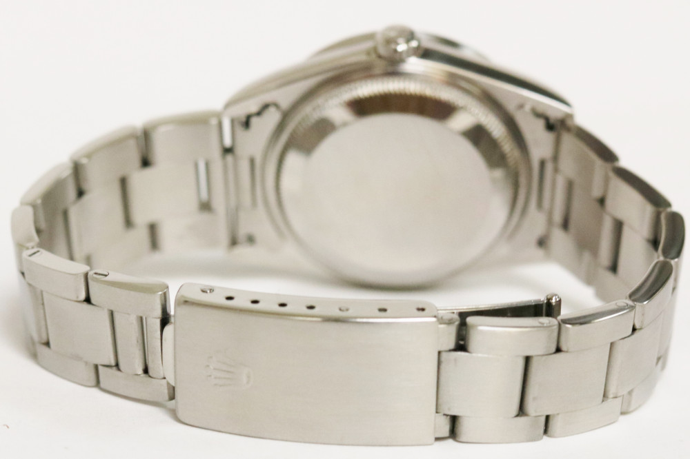 Rolex Oyster Date White Roman Dial 34mm