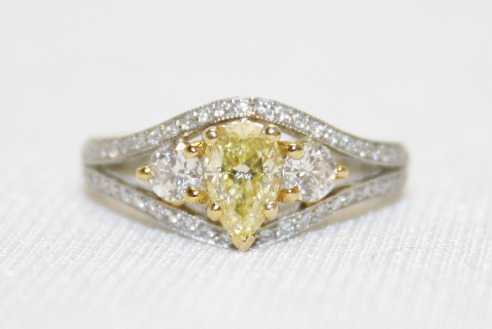 Martin Flyer Pear Shaped Fancy Yellow Diamond Ring – 1.04ct. Total Weight