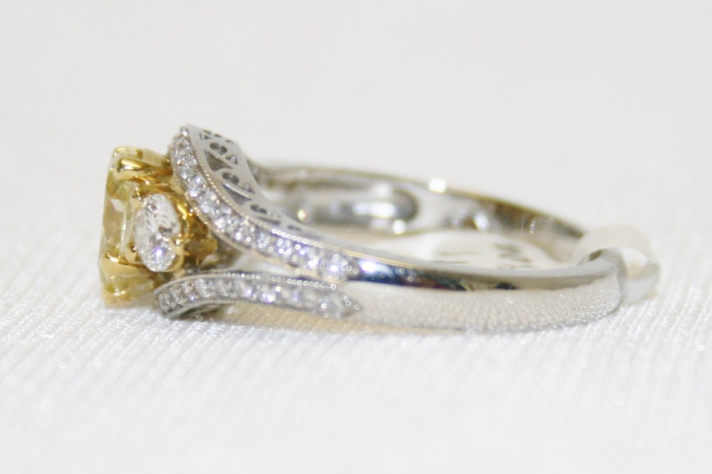 Martin Flyer Pear Shaped Fancy Yellow Diamond Ring – 1.04ct. Total Weight