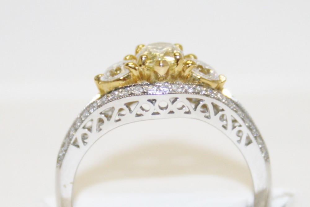 Martin Flyer Pear Shaped Fancy Yellow Diamond Ring – 1.04ct. Total Weight