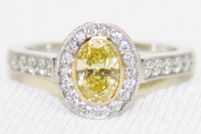 Martin Flyer Oval Brilliant Cut Fancy Yellow Diamond Ring – 0.96ct.
