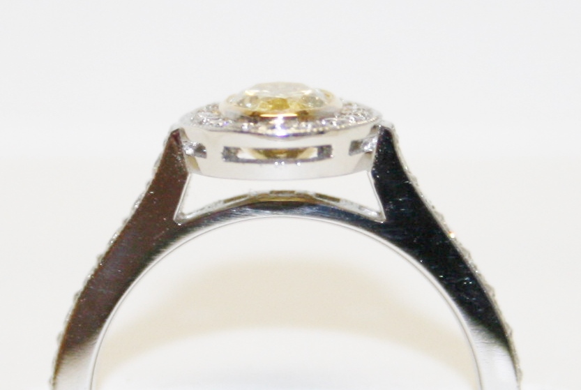Martin Flyer Oval Brilliant Cut Fancy Yellow Diamond Ring – 0.96ct.