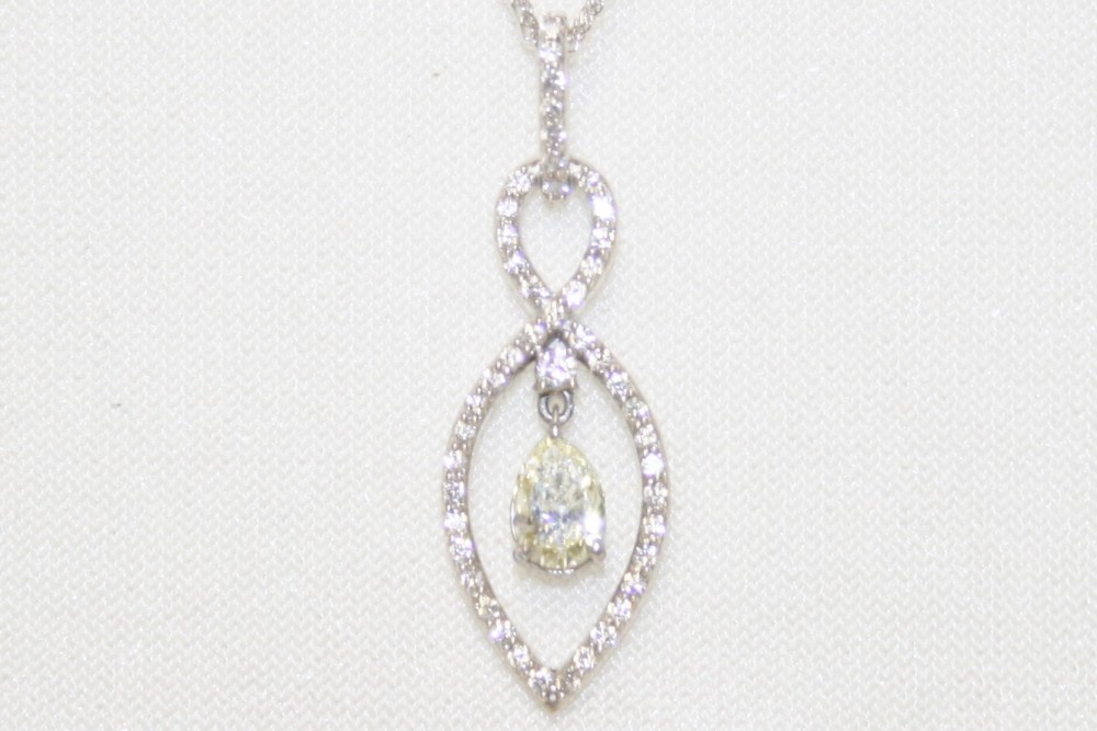 Diamond Pendant with Pear Shaped Diamond Dangle – 0.57ct.