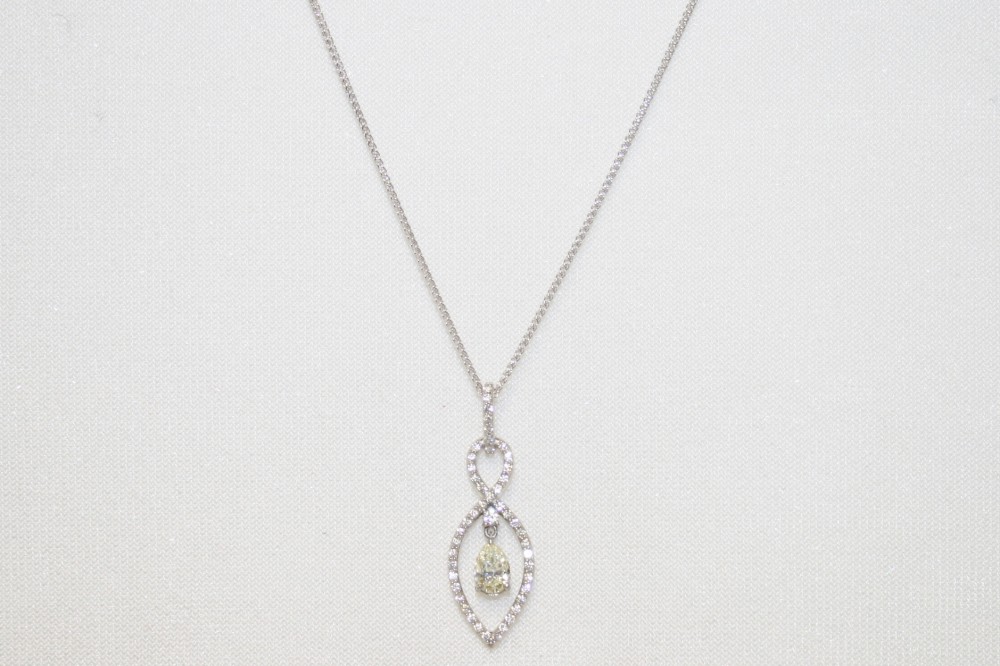 Diamond Pendant with Pear Shaped Diamond Dangle – 0.57ct.