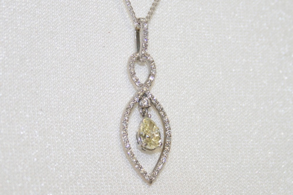 Diamond Pendant with Pear Shaped Diamond Dangle – 0.57ct.