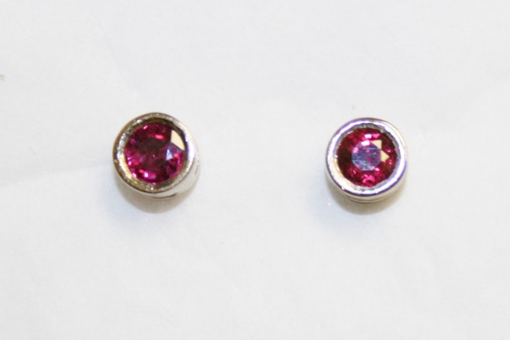 White Gold Ruby Stud Earrings – 0.71ct tw