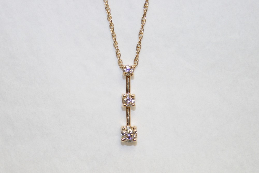 Yellow Gold Three Stone Diamond Pendant – 0.74ct tw