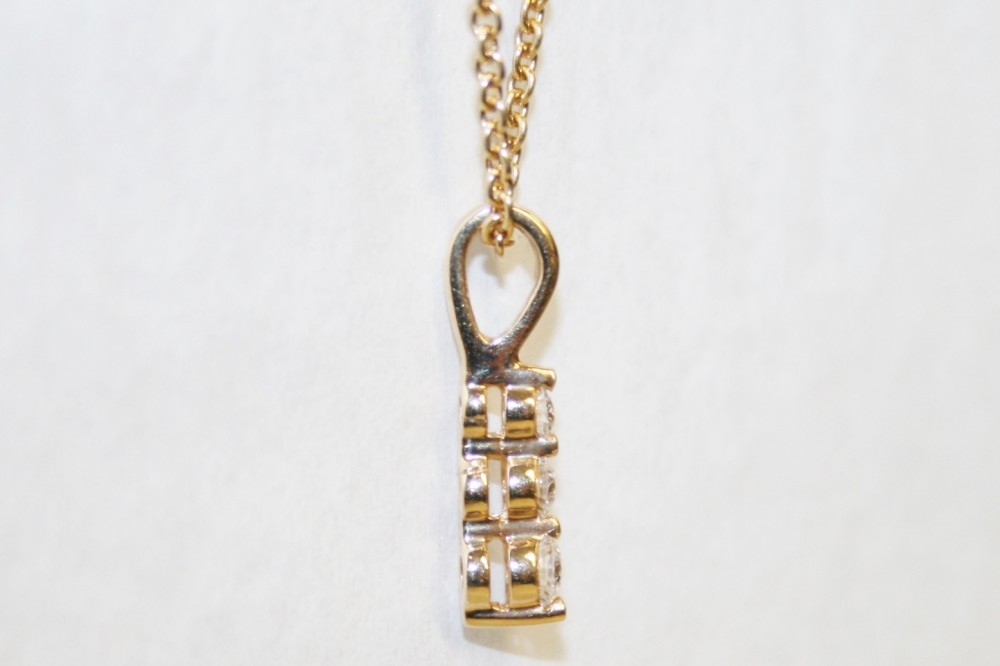 Yellow Gold Three Stone Diamond Pendant – 0.25ct tw