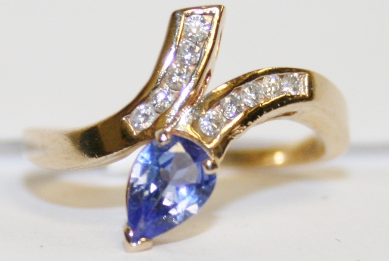 Yellow Gold Tanzanite and Diamond Bypass Ring