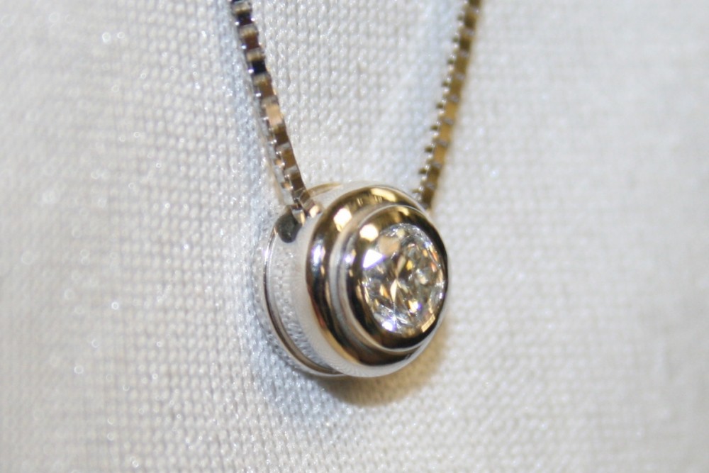 White Gold Bezel Set Diamond Pendant – 0.44ct.